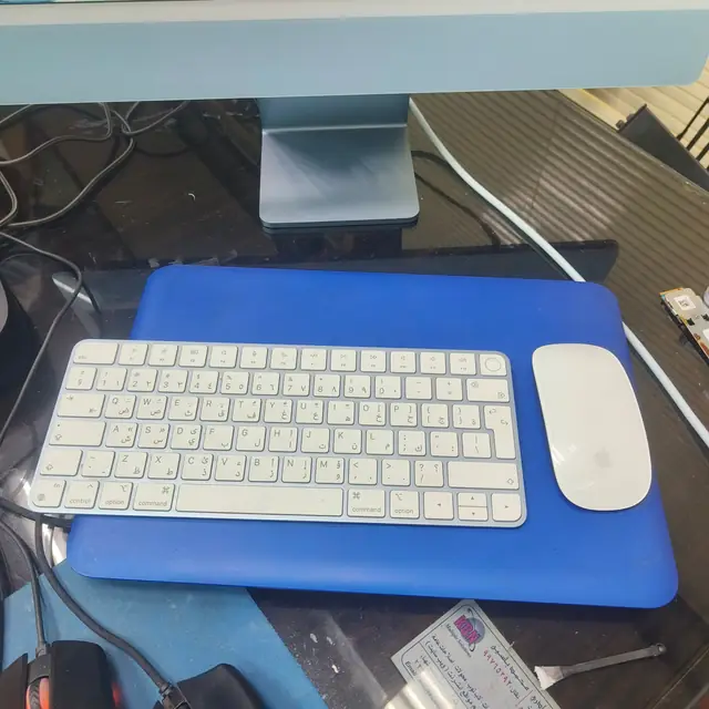 Apple Magic Keyboard (Arabic) and Magic Mouse with an iMac M1