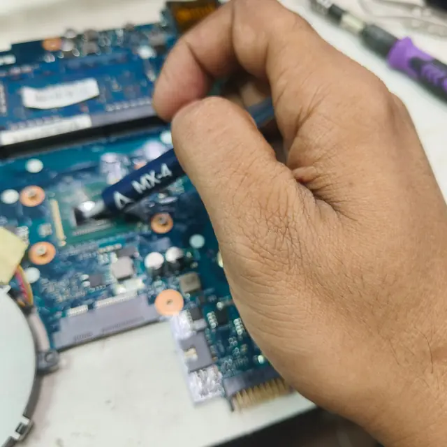 Arctic MX-4 thermal paste applied to a laptop CPU
