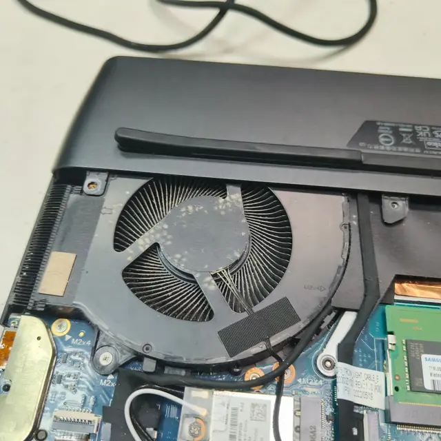 Dell gaming laptop dusty cooling fan before cleaning