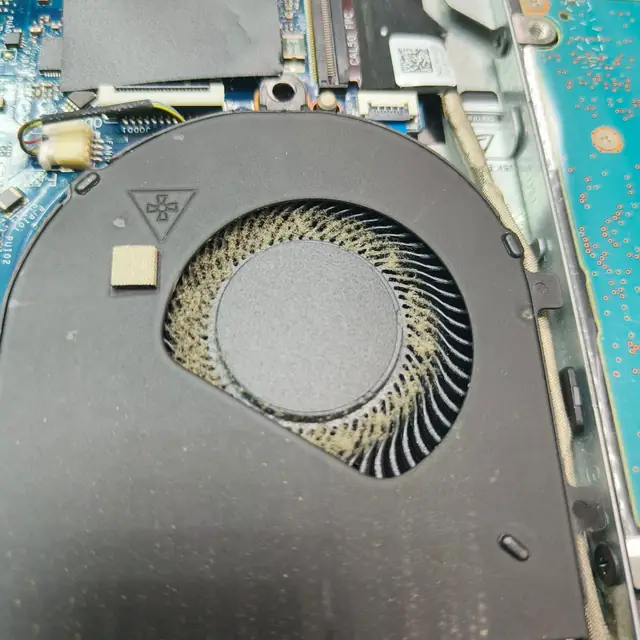 Dell laptop cooling fan dust buildup on blades