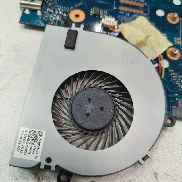 Dell laptop CPU cooling fan dust buildup cleaning