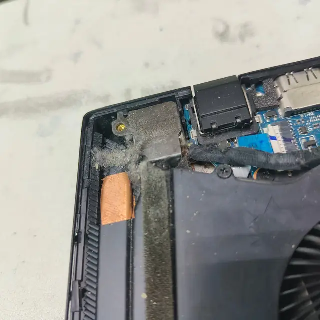 Gaming laptop exhaust vent dust buildup cleaning