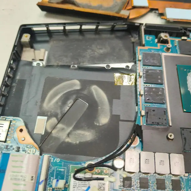 Gaming laptop motherboard fan area thermal pads dust cleaning