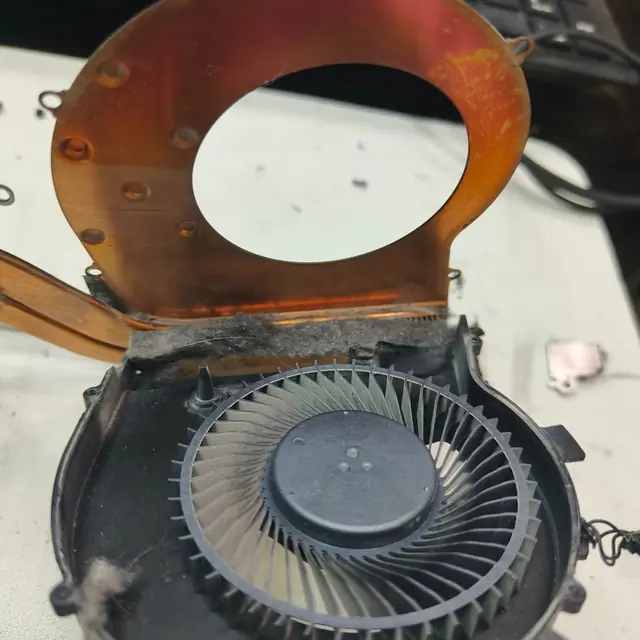 Laptop blower fan cleaned and heatsink removed