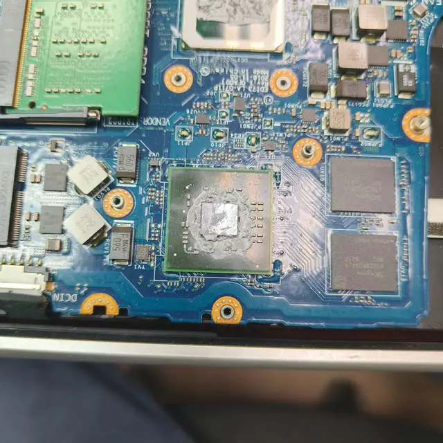 Laptop GPU chip old dried thermal paste before repaste