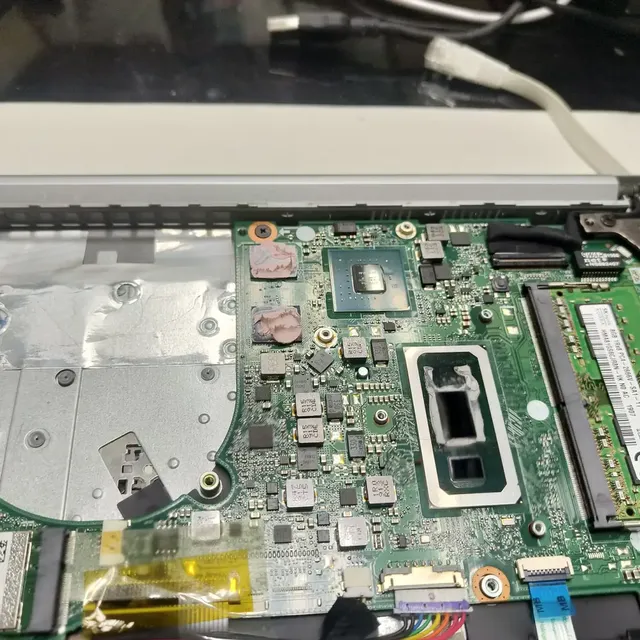 Laptop motherboard CPU socket chips closeup
