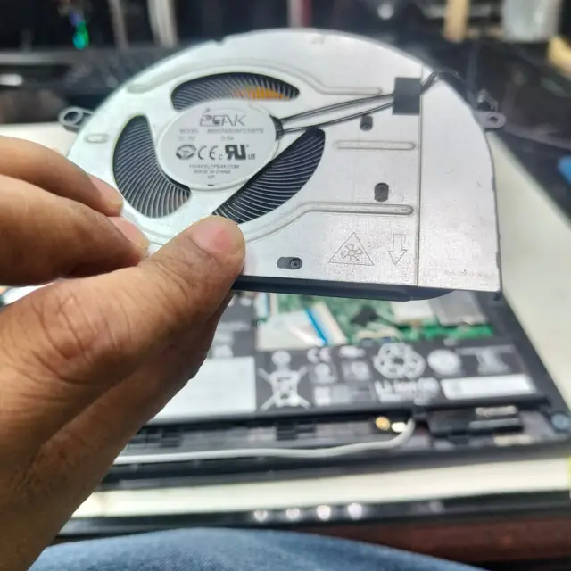 Lenovo laptop cooling fan removed for replacement