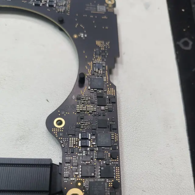 MacBook Pro logic board power section USB-C controller chips