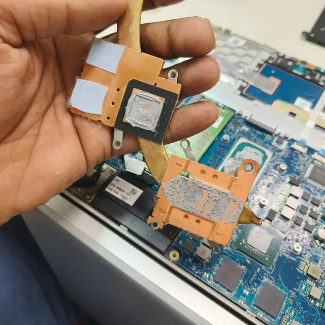 Old dried thermal paste laptop heatsink replacement